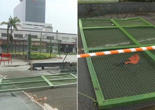 Homem morre atingido por portão de supermercado após carreta bater em pilastra