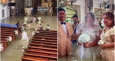 Noivos se casam com água turva na cintura em igreja inundada após enchentes nas Filipinas